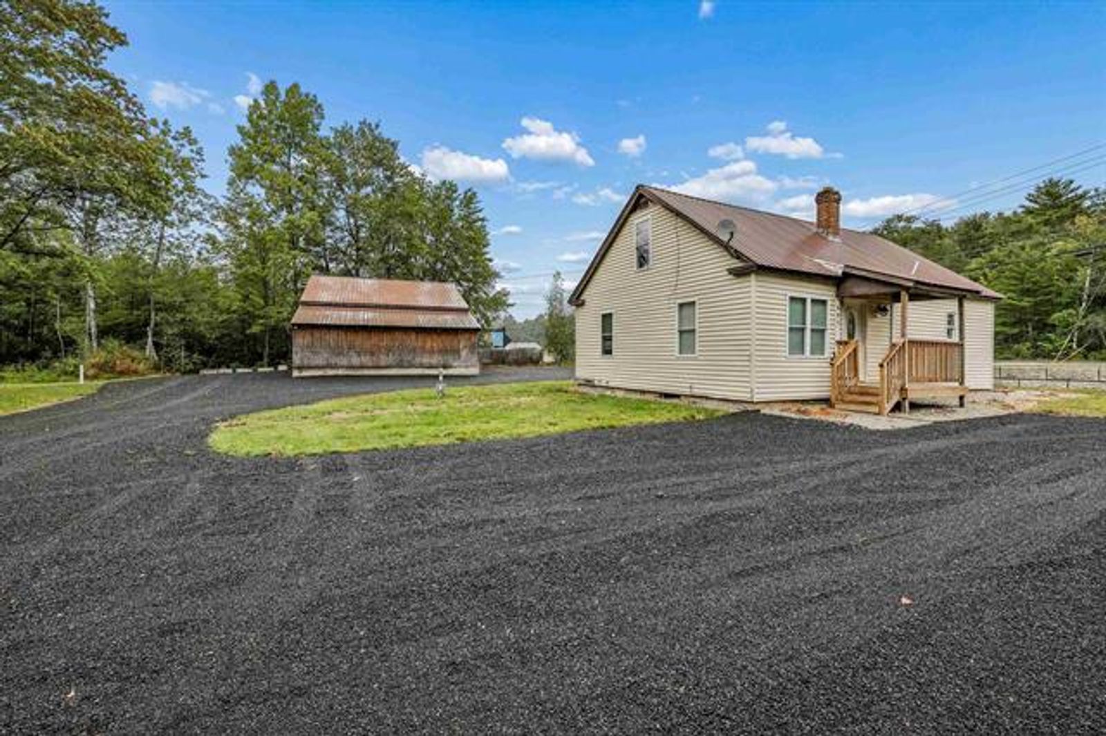 Photo 3 of Business-Zoned Property with Versatile Shop & 3-Bedroom Residence | 655 & 657 W Swanzey Rd