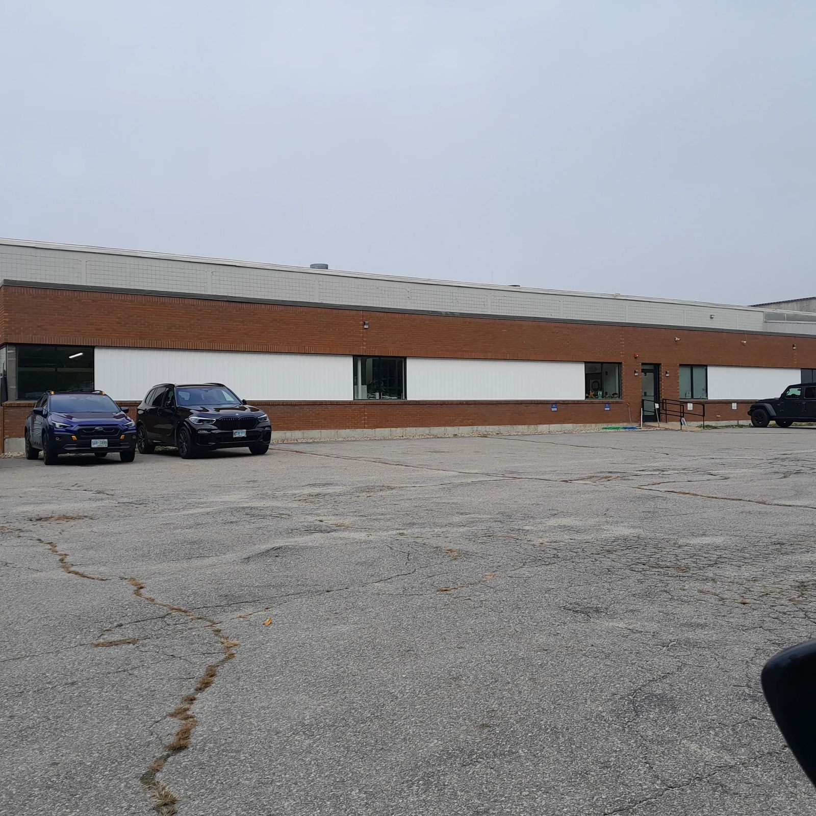 Photo 1 of Flexible Industrial Facility with 24-Foot Clear Height, Heavy-Duty Flooring, Refurbished Offices, and On-Site Solar Revenue Stream